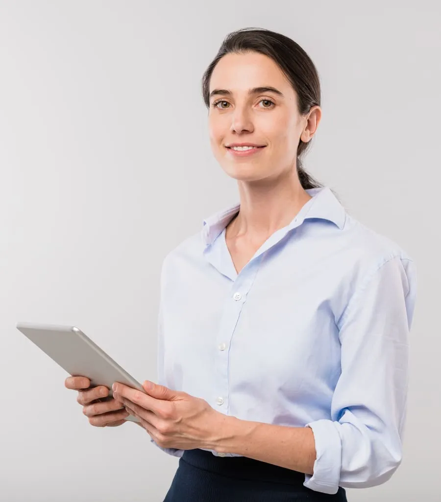 Professional customer support representative holding an iPad, ready to assist with inquiries about discounted iPads for bulk purchase.